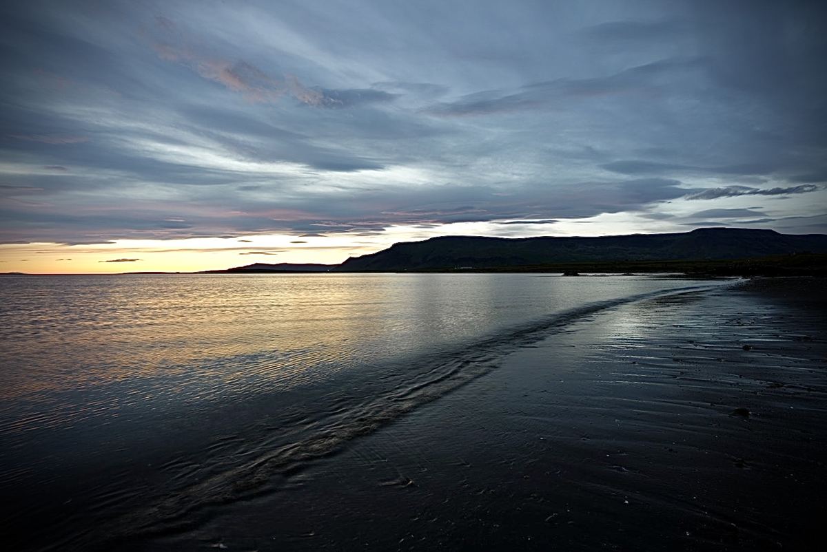 Dark Atlantic surf at dusk